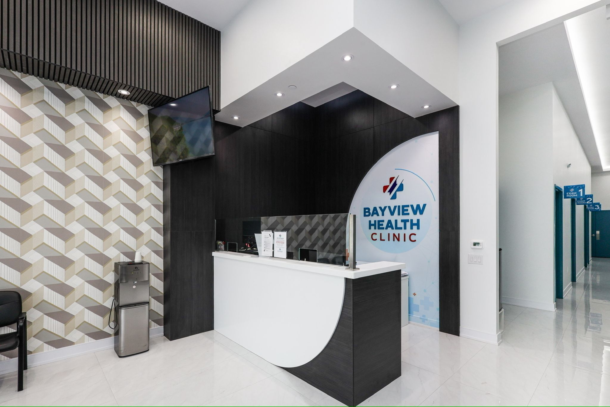 Clinic hallway with exam rooms and counselling room